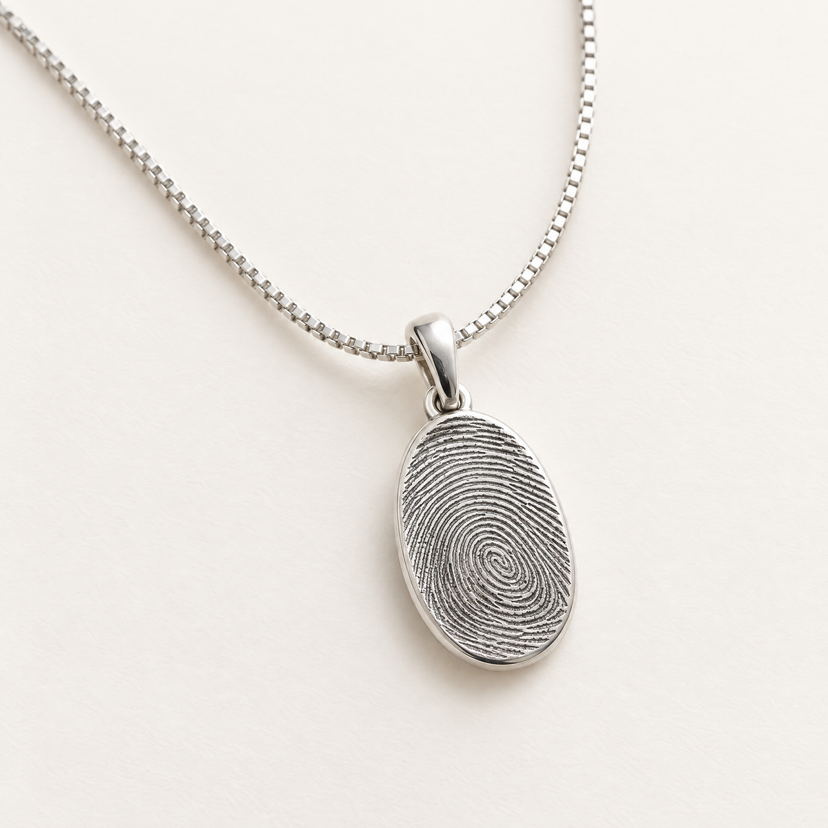Sterling silver fingerprint pendant on a box chain