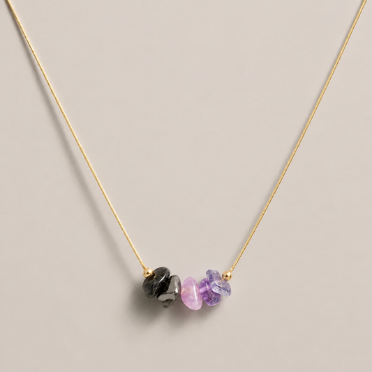 Five-stone Protect Your Peace Necklace shown with a gold-tone chain